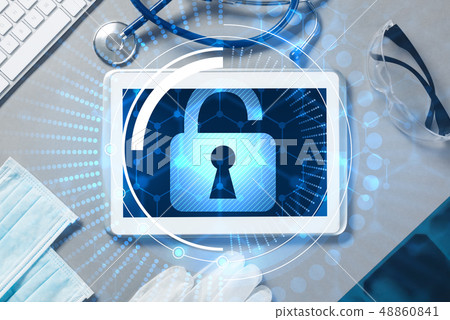 Top view of doctor workplace with tablet pc and medicine tools on wooden table Top view of doctor workplace with tablet pc and medicine tools on wooden table 48860841