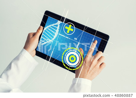 Close of female doctor hands working with tablet pc computer 48860887