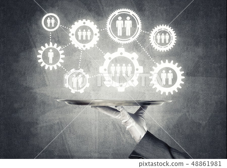 Waiter hand with white gloves holding silver plate full of social media communication icons 48861981
