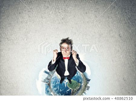 Businessman on Earth globe Businessman on Earth globe 48862510