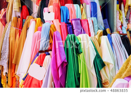 Satin has many colors. Fabric sale in stores. Satin has many colors. Fabric sale in stores. 48863835