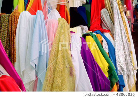 Satin has many colors. Fabric sale in stores. Satin has many colors. Fabric sale in stores. 48863836