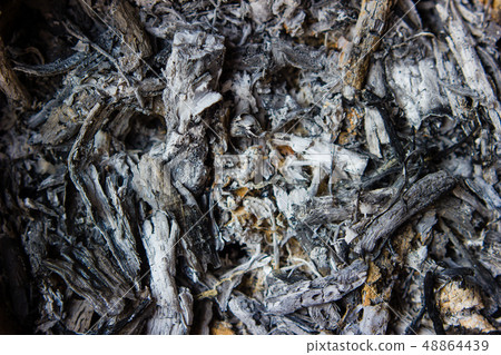Pile of ashes from burn the wood in the stove. Pile of ashes from burn the wood in the stove. 48864439