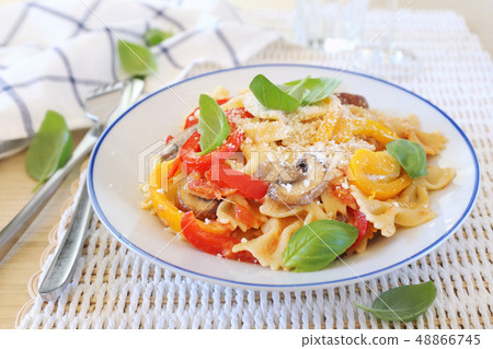 Italian food. Farfalle pasta with mushrooms Italian food. Farfalle pasta with mushrooms 48866745