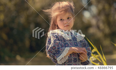 Portrait of a girl in the garden 48866795
