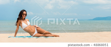 Beautiful young Asian woman in white bikini on Beautiful young Asian woman in white bikini on 48868051