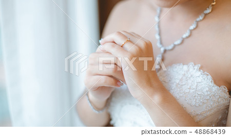 Asian bride and her wedding ring Asian bride and her wedding ring 48868439