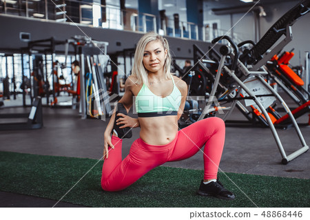 woman doing stretching woman doing stretching 48868446