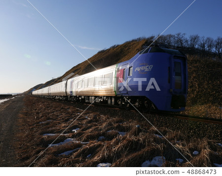Express Super Ozora running through the Otobetsu Coast Express Super Ozora running through the Otobetsu Coast 48868473
