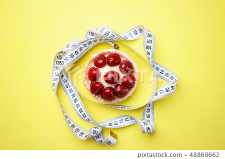 diet. delicious sweet berry cake and measure tape diet. delicious sweet berry cake and measure tape 48868662