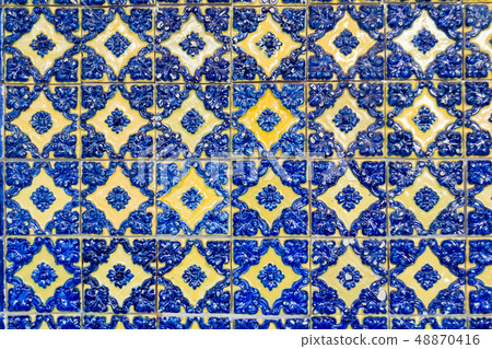 Decorative tiles (or azulejos) in a wall in the 48870416