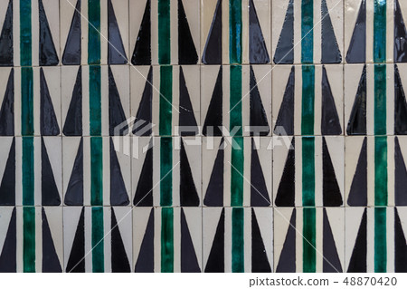 Decorative tiles (or azulejos) in a wall in the 48870420
