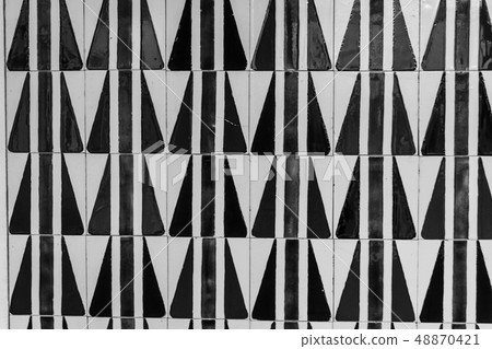 Decorative tiles (or azulejos) in a wall in the 48870421