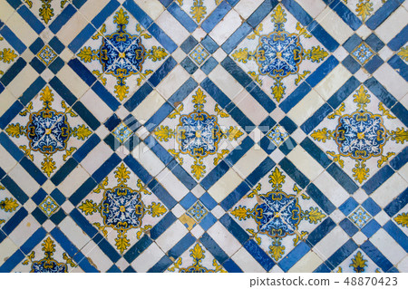 Decorative tiles (or azulejos) in a wall in the 48870423