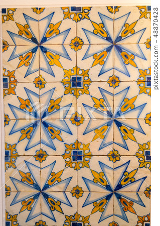 Decorative tiles (or azulejos) in a wall in the 48870428
