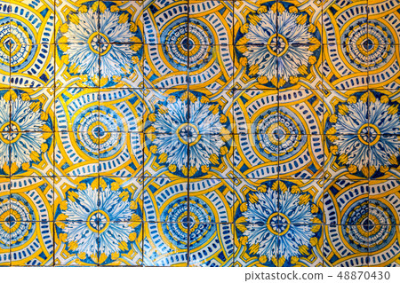 Decorative tiles (or azulejos) in a wall in the 48870430
