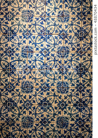 Decorative tiles (or azulejos) in a wall in the 48870434