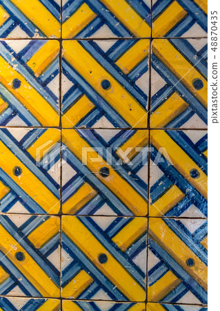 Decorative tiles (or azulejos) in a wall in the 48870435