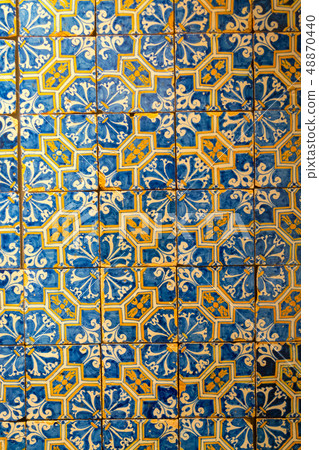 Decorative tiles (or azulejos) in a wall in the 48870440