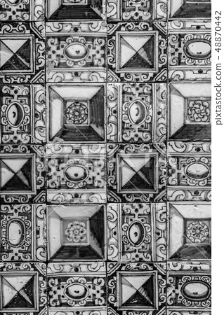 Decorative tiles (or azulejos) in a wall in the 48870442