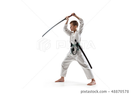 Teen boy fighting at aikido training in martial arts school Teen boy fighting at aikido training in martial arts school 48870578
