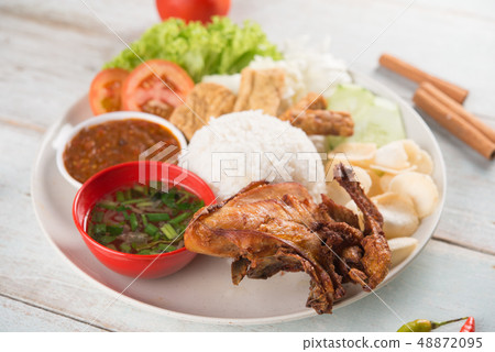 Nasi lemak kukus with fried chicken 48872095