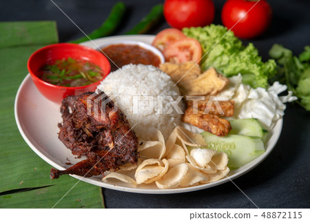 Nasi lemak kukus with quail meat 48872115