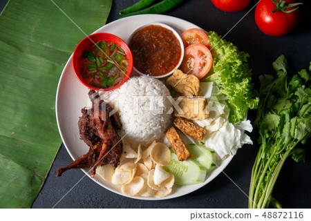 Nasi lemak kukus with quail meat 48872116