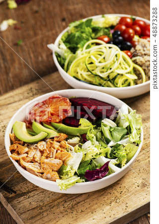 buddha bowl salads on a wooden table 48873288