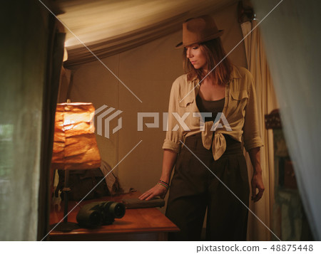 Beautiful woman in a tent at savanna, Kenya 48875448