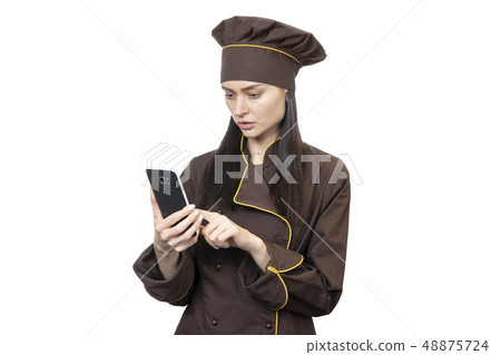 chef with a phone in his hand chef with a phone in his hand 48875724