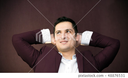 Successful young man in a suit. Successful young man in a suit. 48876531