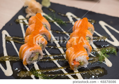 Salmon Sushi roll set served on plate Salmon Sushi roll set served on plate 48878086