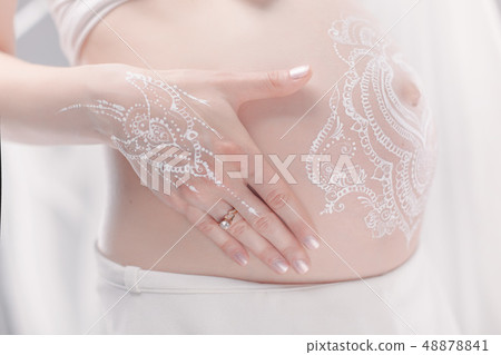 Pregnant bellypainting in boho style. 48878841
