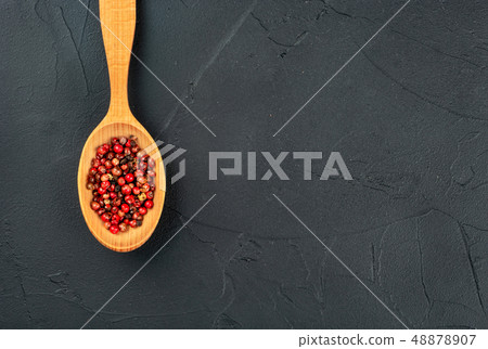 Red pepper peas in spoon Red pepper peas in spoon 48878907