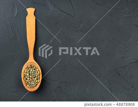 Green pepper peas in spoon Green pepper peas in spoon 48878908