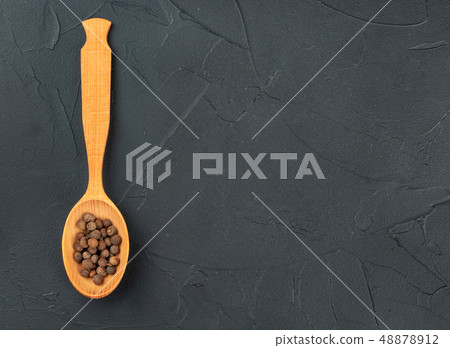 Fragrant pepper peas in a spoon Fragrant pepper peas in a spoon 48878912