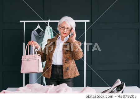 showroom vip senior business woman shopping trendy 48879205