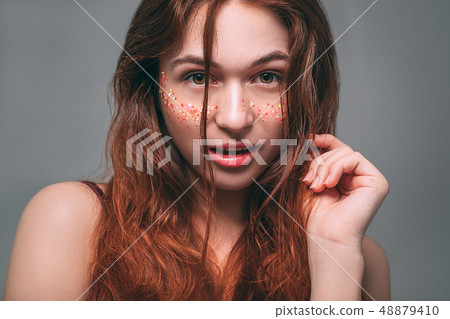 young fashion model portrait teasing suspicion young fashion model portrait teasing suspicion 48879410