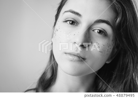 young woman beauty fashion glitter freckles makeup young woman beauty fashion glitter freckles makeup 48879495