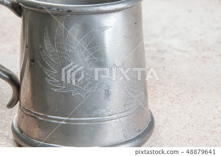 Vintage pewter beer mug close up 48879641