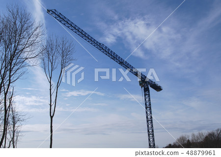 crane on construction site hoist lifting  48879961