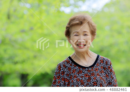 A smiling woman with a smile A smiling woman with a smile 48882461