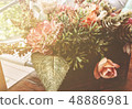 Relaxing in the morning with flowers in vase  48886981