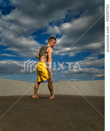 Tricking on the street. Martial arts 48889762