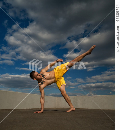Tricking on the street. Martial arts Tricking on the street. Martial arts 48889764