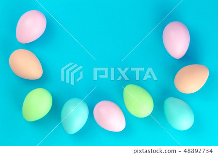 Colorful pastel easter eggs on blue 48892734