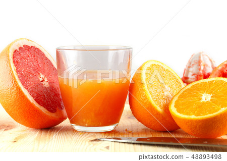 freshly squeezed citrus juice. Orange and grapefruit freshly squeezed citrus juice. Orange and grapefruit 48893498