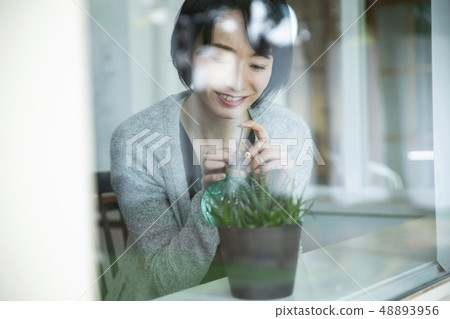 30s woman who loves succulents 48893956