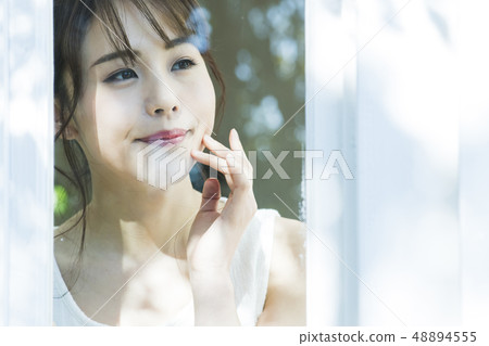 Woman morning morning wake up window beauty lifestyle 48894555